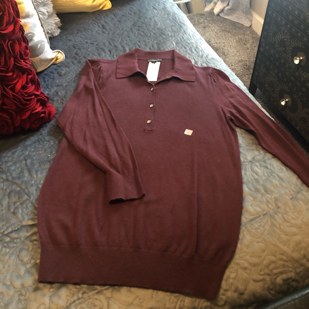 Super cute henley-style sweater.